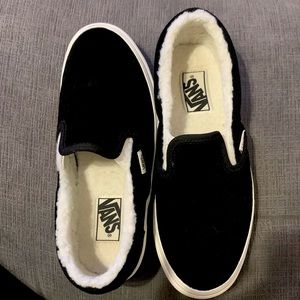 Slip on black vans inside Sherpa